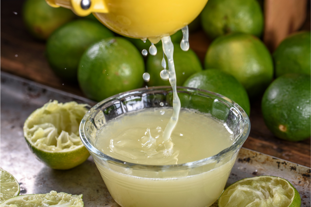 Mango margarita ingredients including lime juice