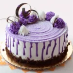 Top 10 Trending Cake Recipes of 2025 (With Gorgeous Variations) 8 Ube cakes with purple frosting, chocolate curls, and drip icing on rustic wooden tables.