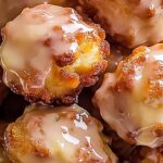 Apple Fritter Bites: Irresistible Doughy Bliss in Every Bite 3 Close-up of glazed mini apple fritters on a serving dish
